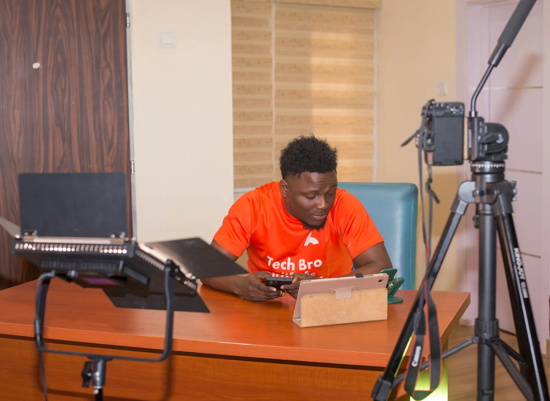 Ayo Olofin working behind the scenes during a studio recording session